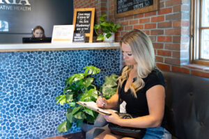 A woman consults over Skin Care in Denver